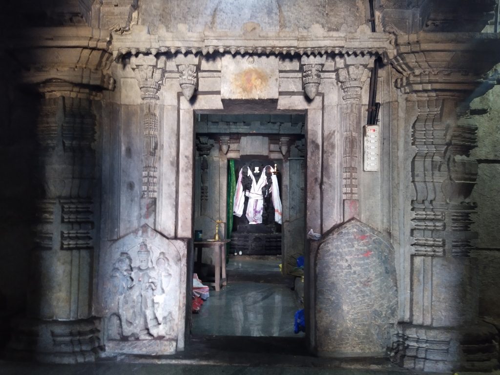 Narayana temple at Aane Kannambadi. On the top and right are uncarved stones.